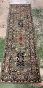 A green and blue runner rug 220cm x 70cm