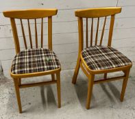 Two vintage chairs with spindle backs