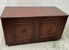 A wooden storage box with panelled sides (H69cm W125cm D56cm)