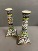 A pair of Portuguese ceramic candlesticks