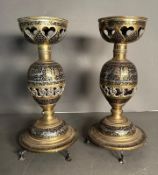 A pair of Indian brass pewter and black lacquer oil lamp bases H40cm