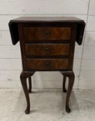 A single three drawer bedside with drop leaf's (H72cm W45cm D31cm)