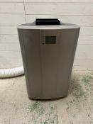 A free standing air conditioning unit on castors