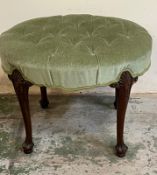 An oval stool with green button back seat (H45cm W62cm D45cm)