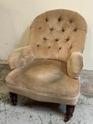 A Victorian button back armchair