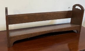 An oak book slide (H24cm W71cm D16cm)