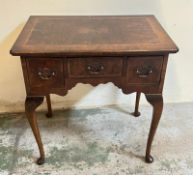 A lowboy with figured walnut top on cabriole legs (H71cm W70cm D45cm)