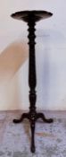 A mahogany ebonised pedestal plant stand on splayed legs H116cm