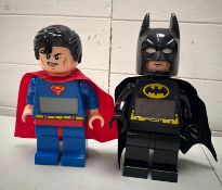 Two LEGO Alarm clocks D C Comics Batman and Superman.