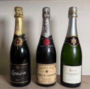 Three bottles of champagne, a Lanson, Moet Chandon and a Harrods Premier Cru