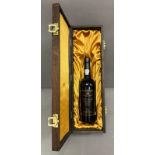 A bottle of Fortnum and Mason 1991 vintage port in presentation box