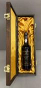 A bottle of Fortnum and Mason 1991 vintage port in presentation box