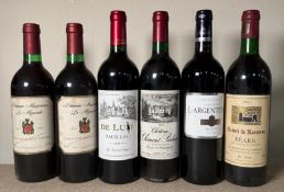 Six bottles of red wine to include a De Luxe Pauillac 2013 and a Chateau Clement Pichion Havt