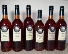 Five bottles of Lyme Bag Cranberry wine and a Raspberry and Apple