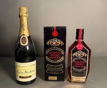 A boxed bottle of Stewarts Dundee eight year old Scotch whisky and a bottle of Nicolas Feuillatte
