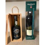 A bottle of Sandemans Founders Reserve (boxed) and a bottle of Graham Crusted port