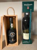 A bottle of Sandemans Founders Reserve (boxed) and a bottle of Graham Crusted port