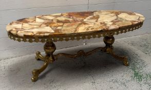 A French style gilt and onyx oval coffee table (H44cm W120cm D50cm)