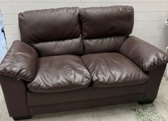 A two seater brown leather sofa (H90cm W164cm SH42cm)