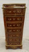 A serpentine fronted Napoleon style Kingswood secrétaire chest, with inlaid veneers and fall-front