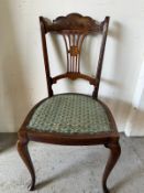 A Victorian inlay side chair with pierced back
