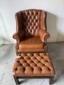 A Chesterfield wingback chair upholstered in buttoned leather, together with a matching