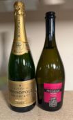 A bottle of Heidsieck Monopole gold top champagne and a Prosecco