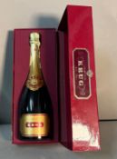 A boxed bottle of Krug Grand Cuvee champagne
