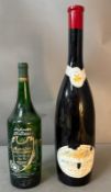 A three litre bottle of Moulinna-vent red wine and a 1.5 litre bottle of Muscadet
