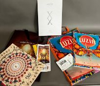 Three Cirque Du Soleil programmes - two in bags and one in a sleeve