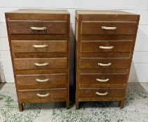A pair of five drawer Mid Century bedsides (H73cm W38cm D34cm)