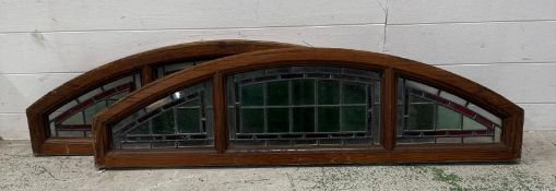 A pair of antique pitch pine stained glass transom windows (121cm x32cm)