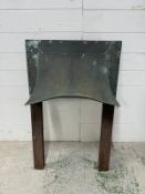 A reclaimed cast iron fireplace surround with copper hood (61cm x 98cm)