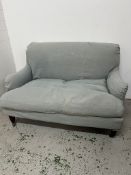 A small two seater sofa