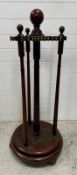 A Victorian mahogany revolving snooker cue stand (H115cm Dia50cm)