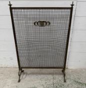 A brass and wire mesh fire screen (72cm x 50cm)