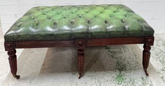 A William IV–Style mahogany large footstool with a deep buttoned leather seat in antique green