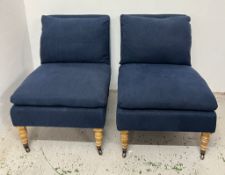 A Pair of OKA “Apadana” Armless Chairs, upholstered in Tarisa ink-blue linen, each with deep seat