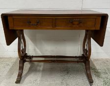 A mahogany two drawer sofa table on lyre supports, turned stretchers and splayed legs (H72cm W92cm