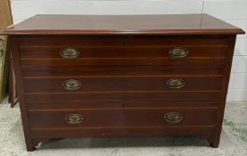A mahogany chest of drawers comprising of three graduated long drawers (H66cm W107cm D45cm)