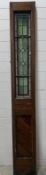 A reclaimed pitched pine stained glass panel (218cm x 30cm)