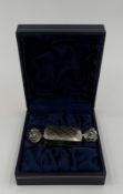 An unhallmarked silver pill box in the form of a sweet (approx total weight 13g)