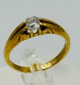 An 18ct gold single stone diamond ring with an approximate weight of 5.1g and size R