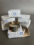 Six silver plated Cavalier napkin rings