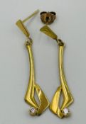 A pair of 14ct, marked 585, gold earrings approximate 2.3g