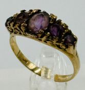 A muti stone amethyst style 9ct gold ring with an approximate weight of 3.1g and size O