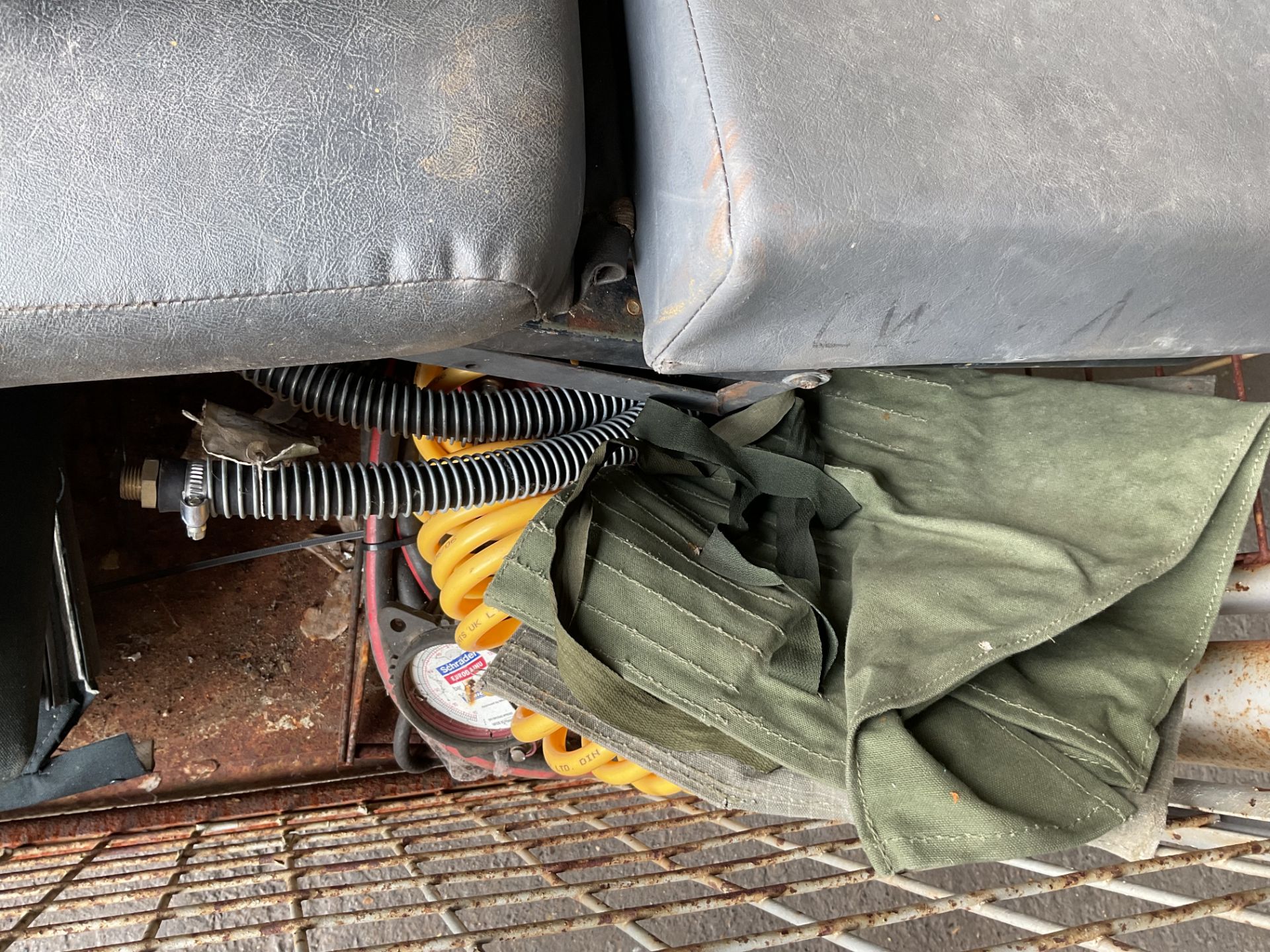 1x Stillage of Land Rover Spares, Seats, Straps, Spare Wheel Warrier Tyre Inflator etc - Image 7 of 7