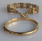 A yellow gold hinged bangle with etched decoration, 60mm, and a gate-link yellow gold bracelet 