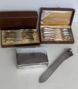 A mid-century German 800 silver oblong cigarette box with wood-lined interior, initialled, 13.5 cm w