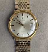 A 1960s Omega De Ville gents stainless steel cased automatic wristwatch, the silver dial 